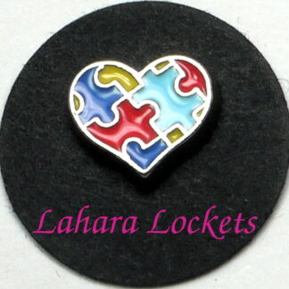 This floating charm is shaped like a heart and has a multicolored puzzle design on it.