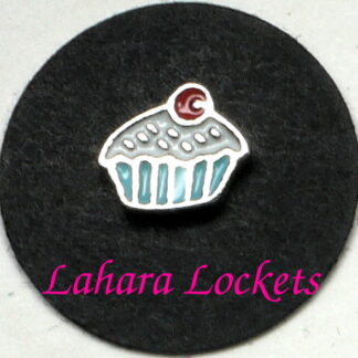 This floating charm is a cupcake with blue liner, white frosting and red cherry on top.