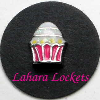 This floating charm is a cupcake with pink liner and shiny, white frosting.