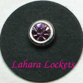 This round floating charm is silver with a pink, June birthstone.