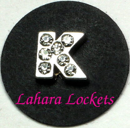 This floating charm is a silver letter K with clear gems.