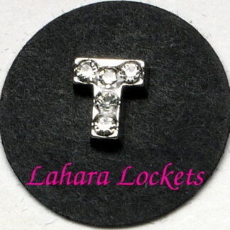 This floating charm is a silver letter T with clear gems.