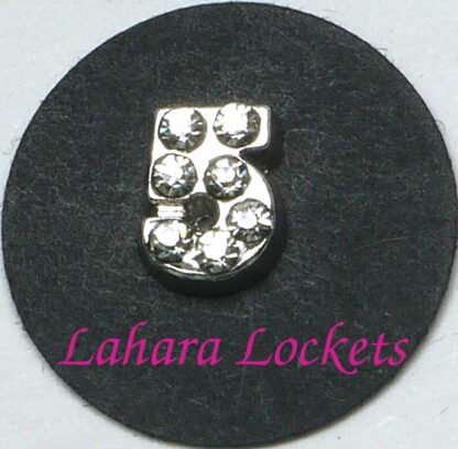This floating charm is a silver, number five with clear gems.
