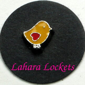 This floating charm is a yellow chick with red heart wing.