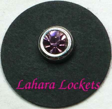 This round floating charm is silver with a pink, June birthstone.