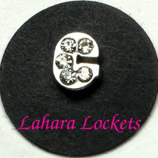 This floating charm is a silver letter c with clear gems.