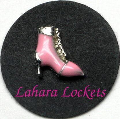This floating charm is a pink, lace-up boot.