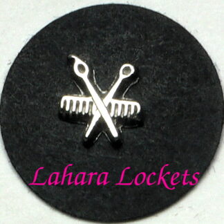 This lfoating charm is a silver scissors and comb combination.